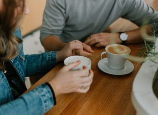 Casual Dating 101: How to Navigate Apps Without the Drama two mugs with coffee on table